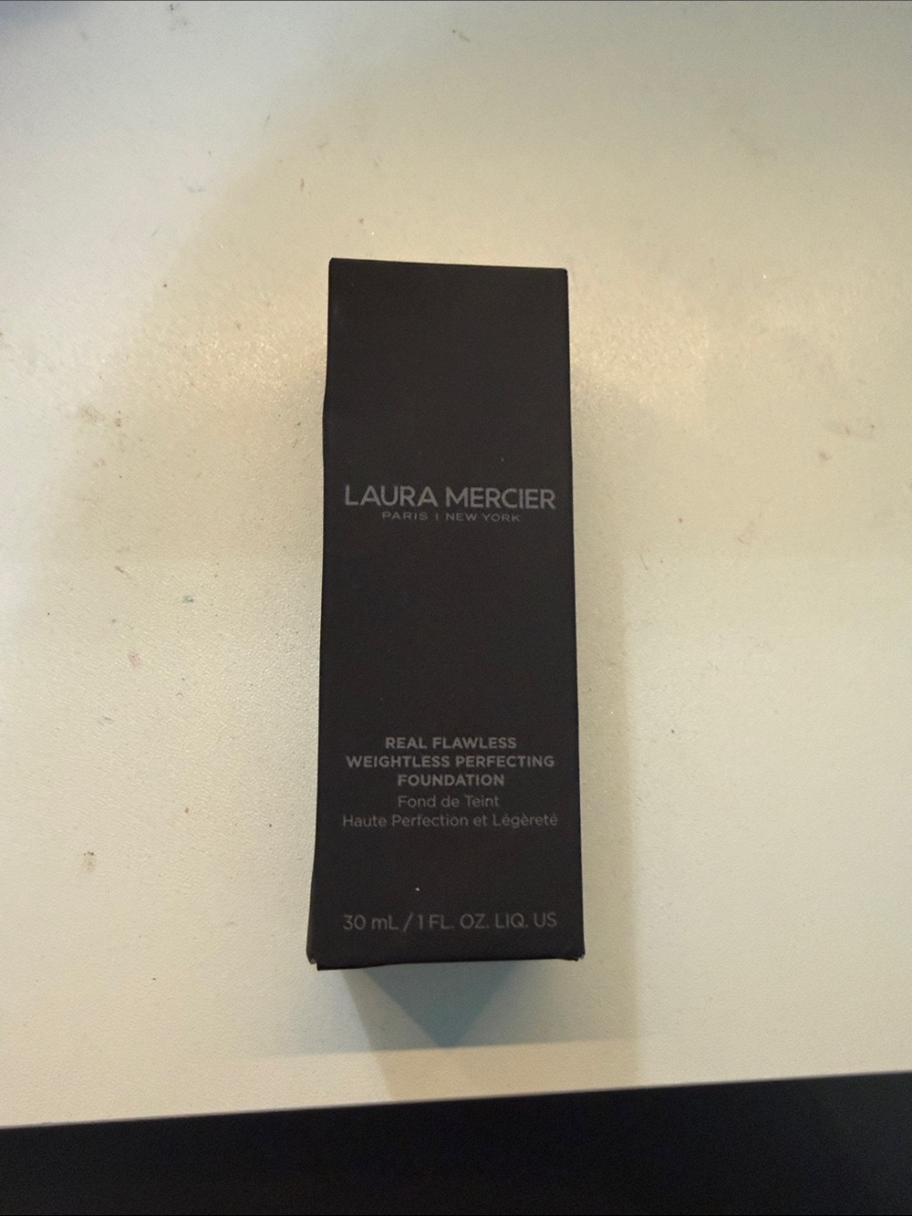 Laura Mercier Foundation in Black Box with Silver Text